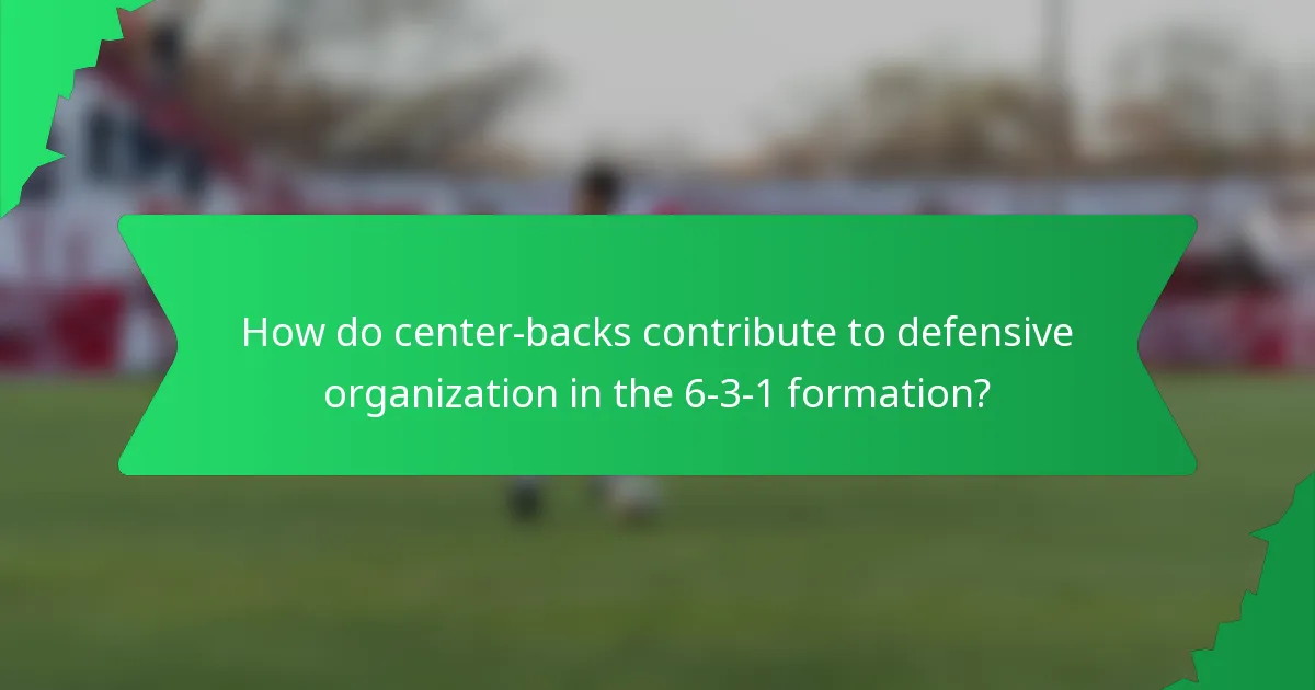 How do center-backs contribute to defensive organization in the 6-3-1 formation?